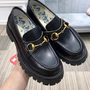 Gucci Black Leather Loafers with Gold Detail
